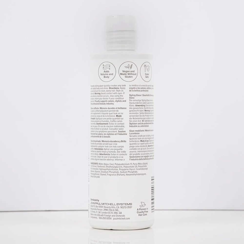 Bouteille blanche de glaçage coiffant Paul Mitchell Super Sculpt :250 ml tenue flexible, pour une mémoire durable, du corps et de la brillance, avec une étiquette rouge."