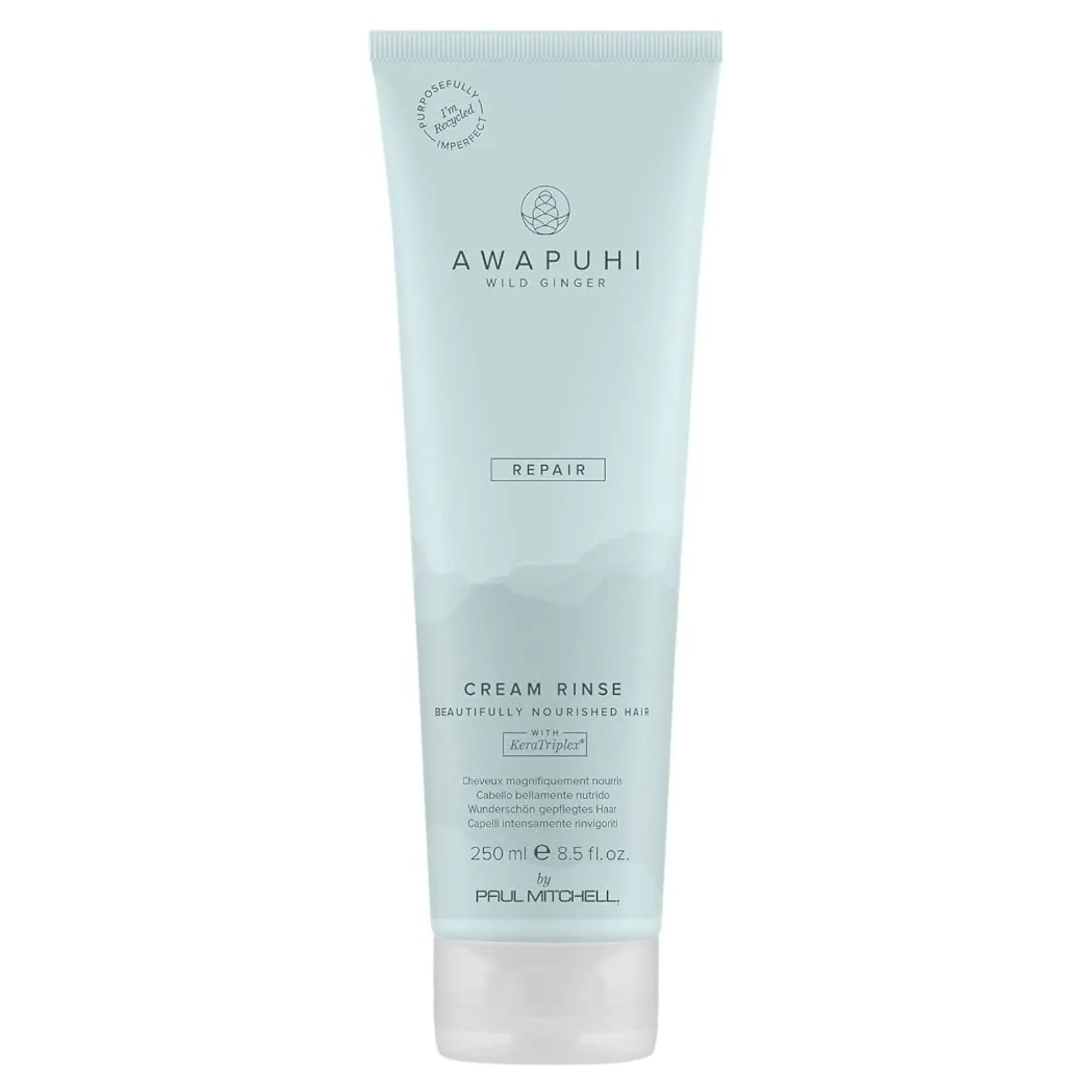Flacon bleu pâle de Paul Mitchell Awapuhi Wild Ginger Cream Rinse 250ml : revitalisant réparateur pour cheveux secs, abîmés et colorés, infusé de KeraTriplex.