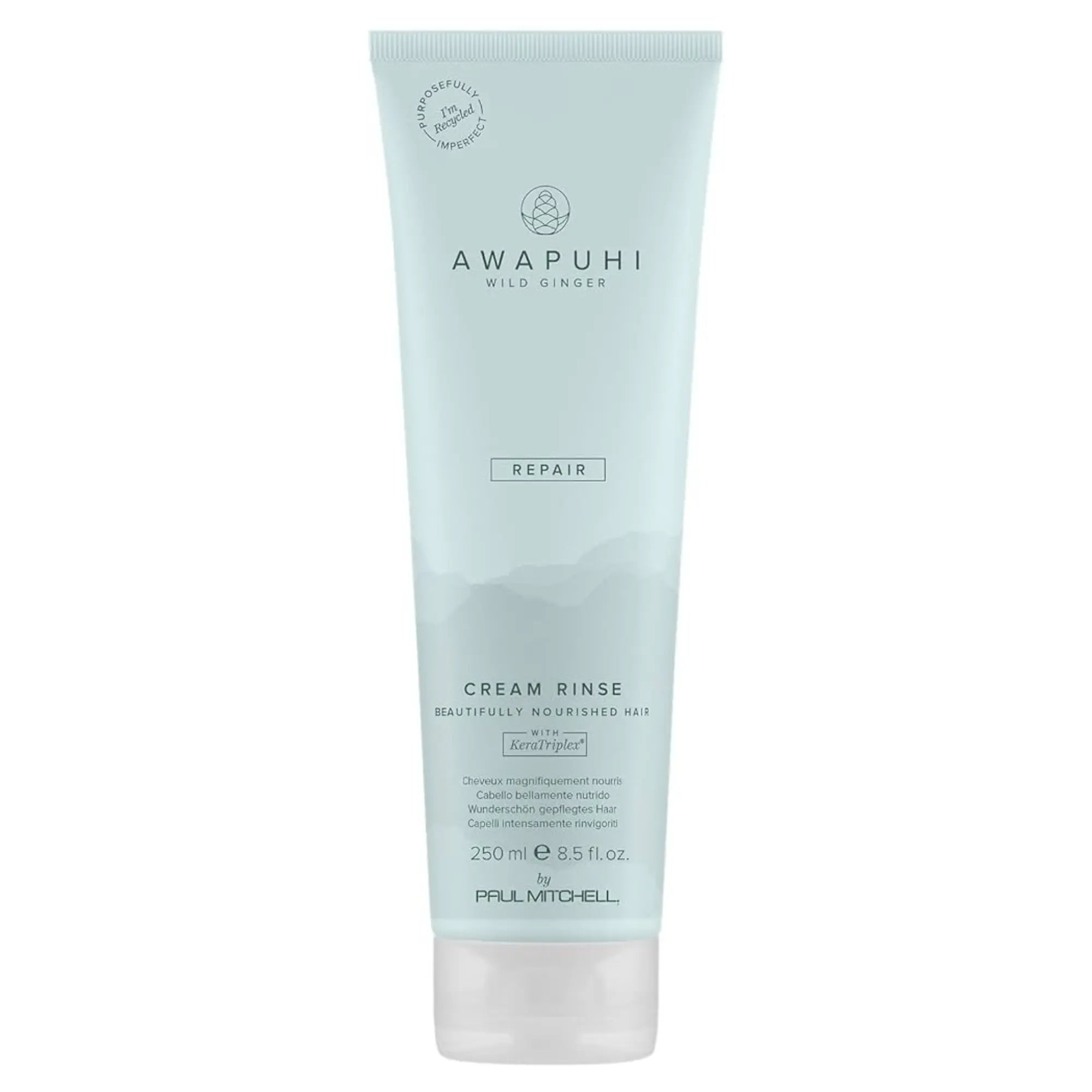 Flacon bleu pâle de Paul Mitchell Awapuhi Wild Ginger Cream Rinse 250ml : revitalisant réparateur pour cheveux secs, abîmés et colorés, infusé de KeraTriplex.