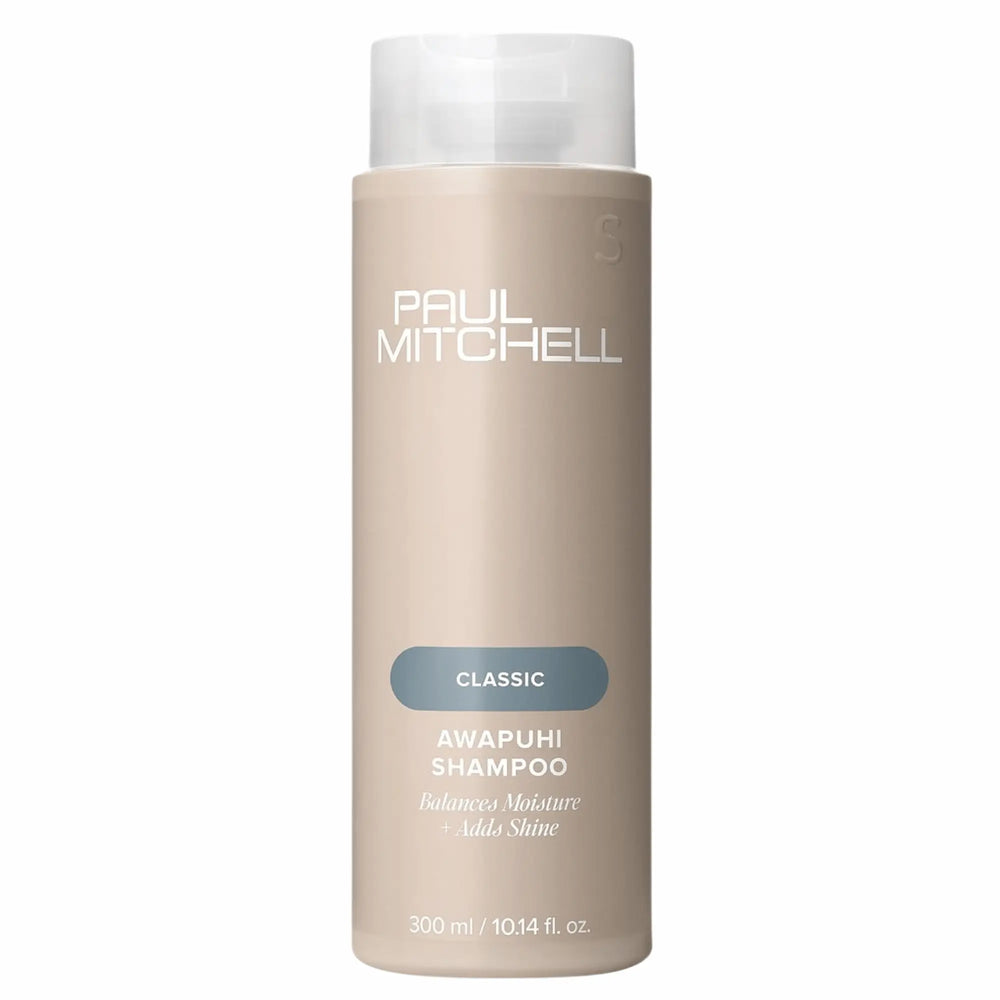 Bouteille de shampoing Paul Mitchell Classic Awapuhi 300ml: de couleur beige avec étiquette bleu-vert, pour équilibrer l'hydratation, ajouter de la brillance et éliminer l'accumulation de résidus.
