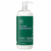 Bouteille verte de 1L du revitalisant hydratant tea tree lavender mint de la marque Paul Mitchell.
