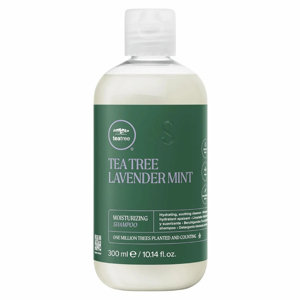 Bouteille transparente avec bouchon blanc de shampoing hydratant Paul Mitchell Tea Tree Lavender Mint 300ml : étiquette verte, nettoie et apaise les cheveux secs et épais."