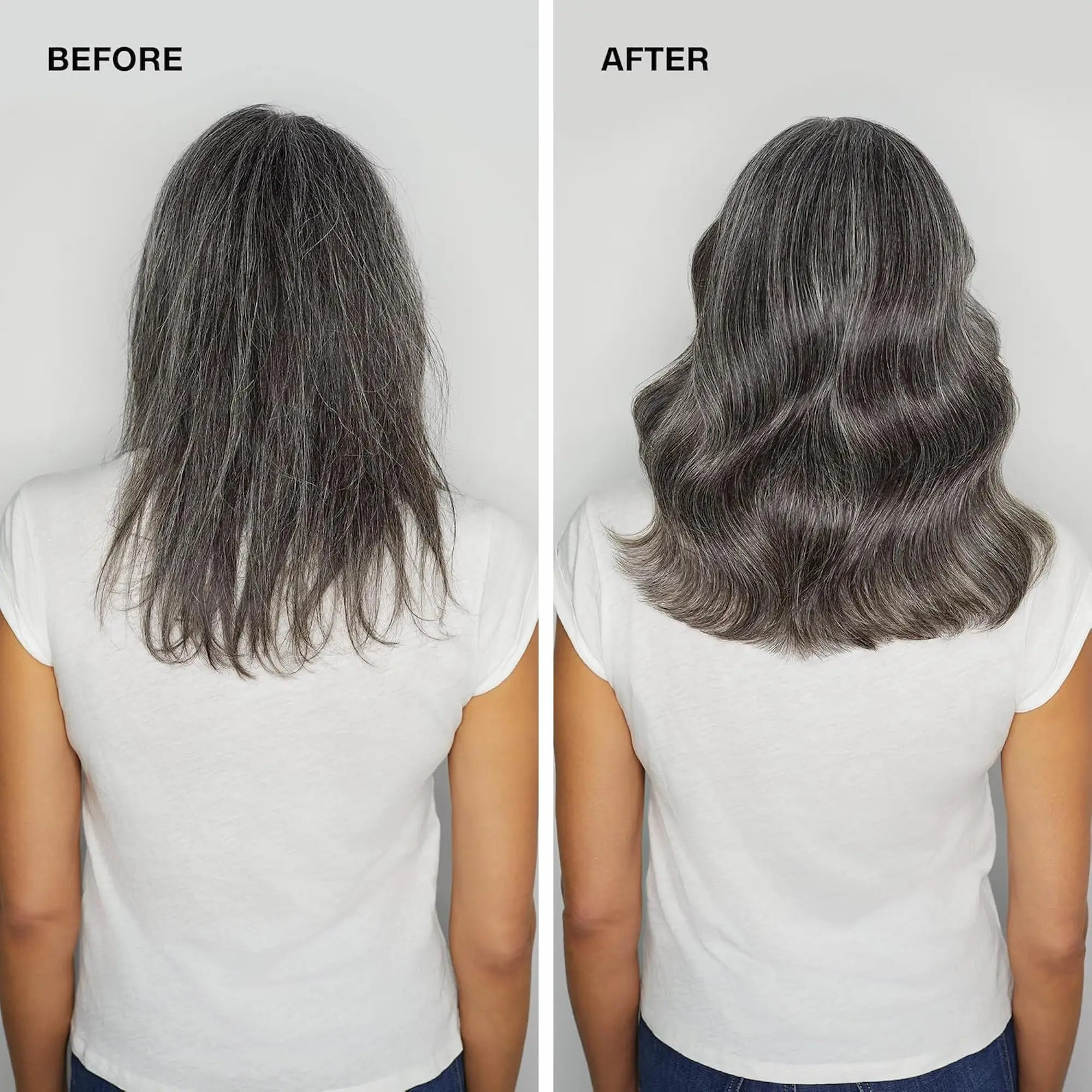 Bouteille blanche de Paul Mitchell Extra-Body Root Boost 250ml: spray volumisant pour cheveux fins, avec une tenue souple et un applicateur ciblé pour un lift en racines.
