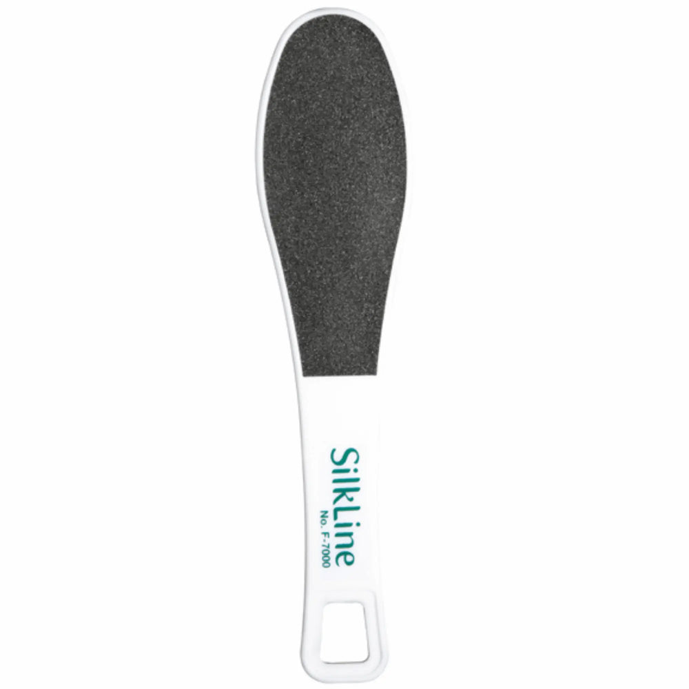 Lime à pied ergonomique Silkline blanche avec surfaces abrasives noires grain 80 et 180 pour le soin professionnel des callosités.