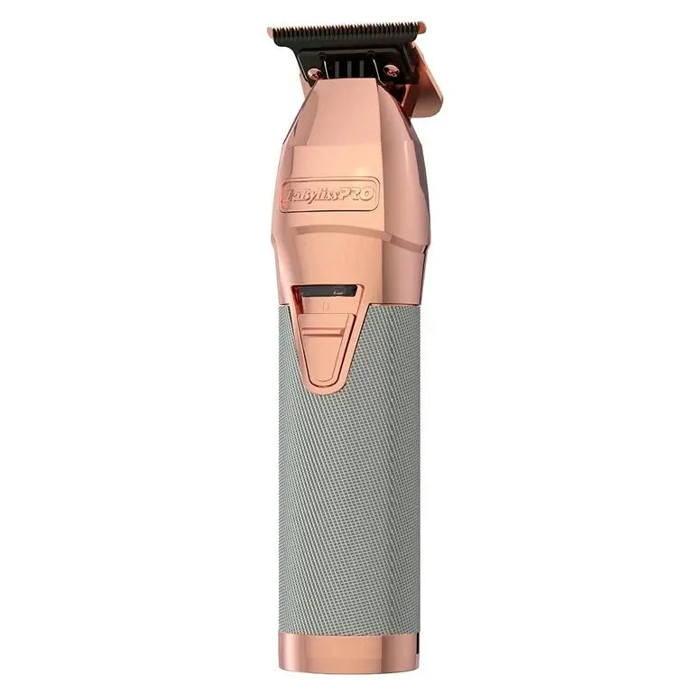 Tondeuse de finition professionnelle BaBylissPRO RoseFX métallique rose doré avec lame en T apparente et moteur haute performance sur fond blanc.