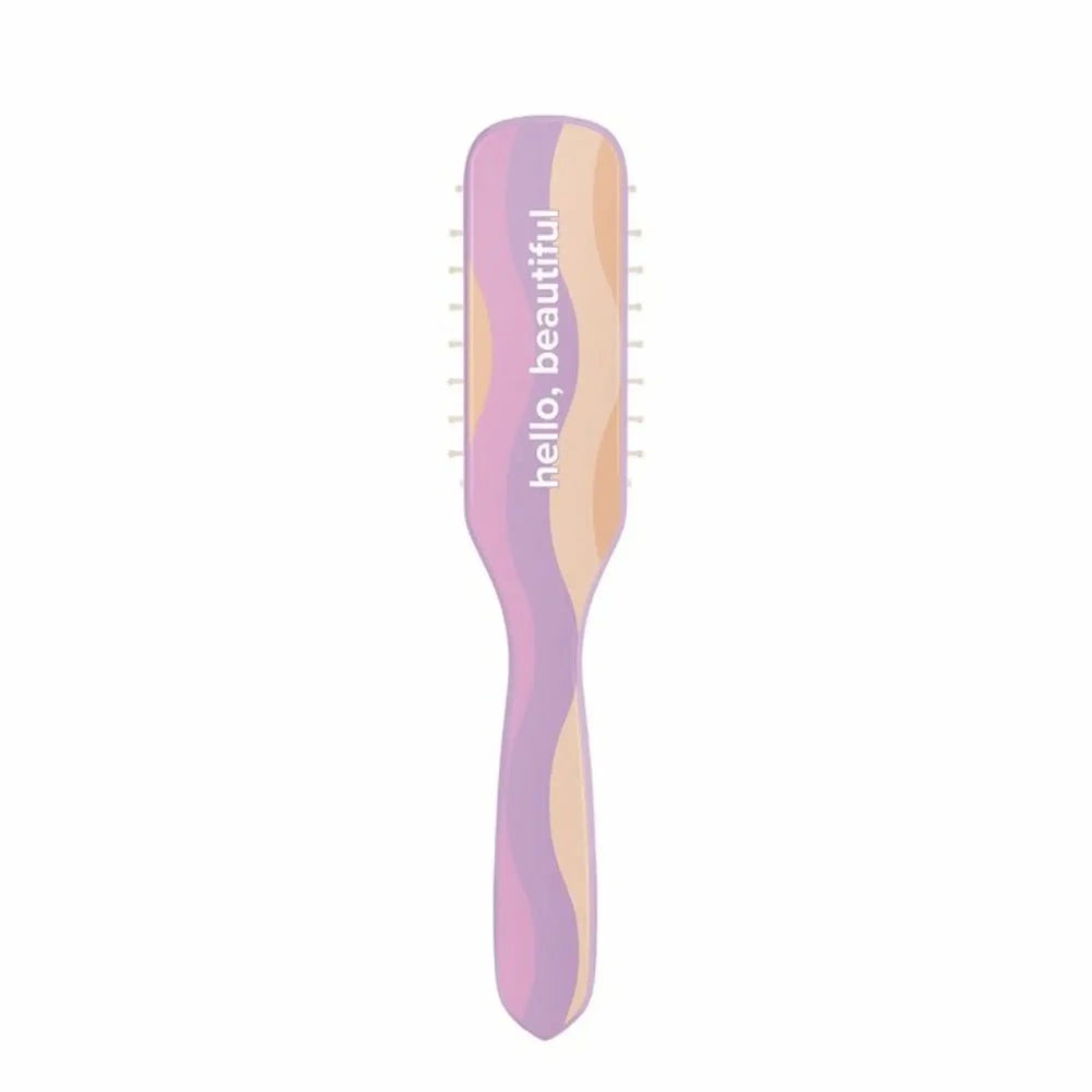 Brosse démêlante professionnelle Paul Mitchell à 7 rangées de picots, dotée d'un design ergonomique aux couleurs vives violet, orange et beige pour un lissage et un coiffage précis.