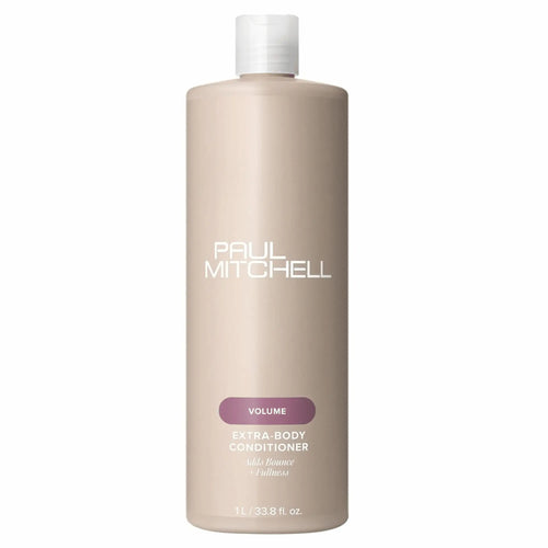 Bouteille beige de revitalisant Paul Mitchell Extra-Body 1L : étiquette mauve, pour ajouter du rebond et de la plénitude aux cheveux fins ou normaux.