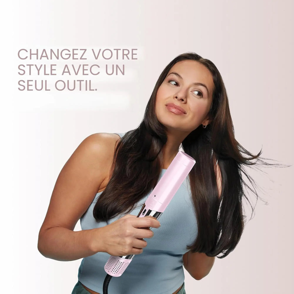 Multi-styler 5-en-1 BaBylissPRO Style/Switch rose métallique, doté d'une poignée ergonomique mince et de cinq accessoires interchangeables argentés et bleus, dont une brosse ronde, une brosse plate et un diffuseur.
