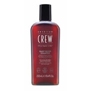 Flacon gris de shampoing American Crew Daily Silver avec bouchon noir, conçu pour neutraliser les reflets jaunes des cheveux gris.